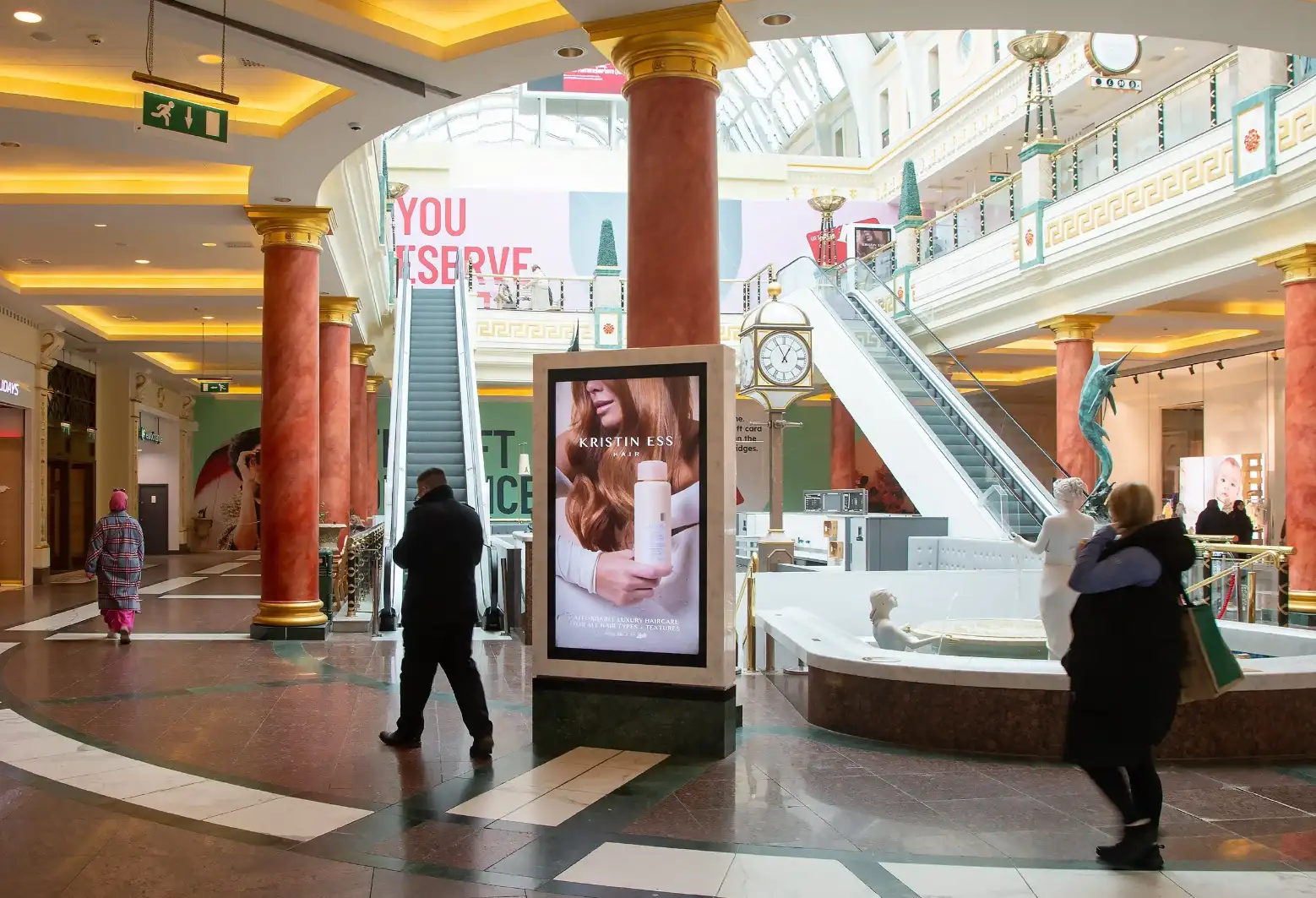 Kristin Ess display screen in a shopping centre atrium