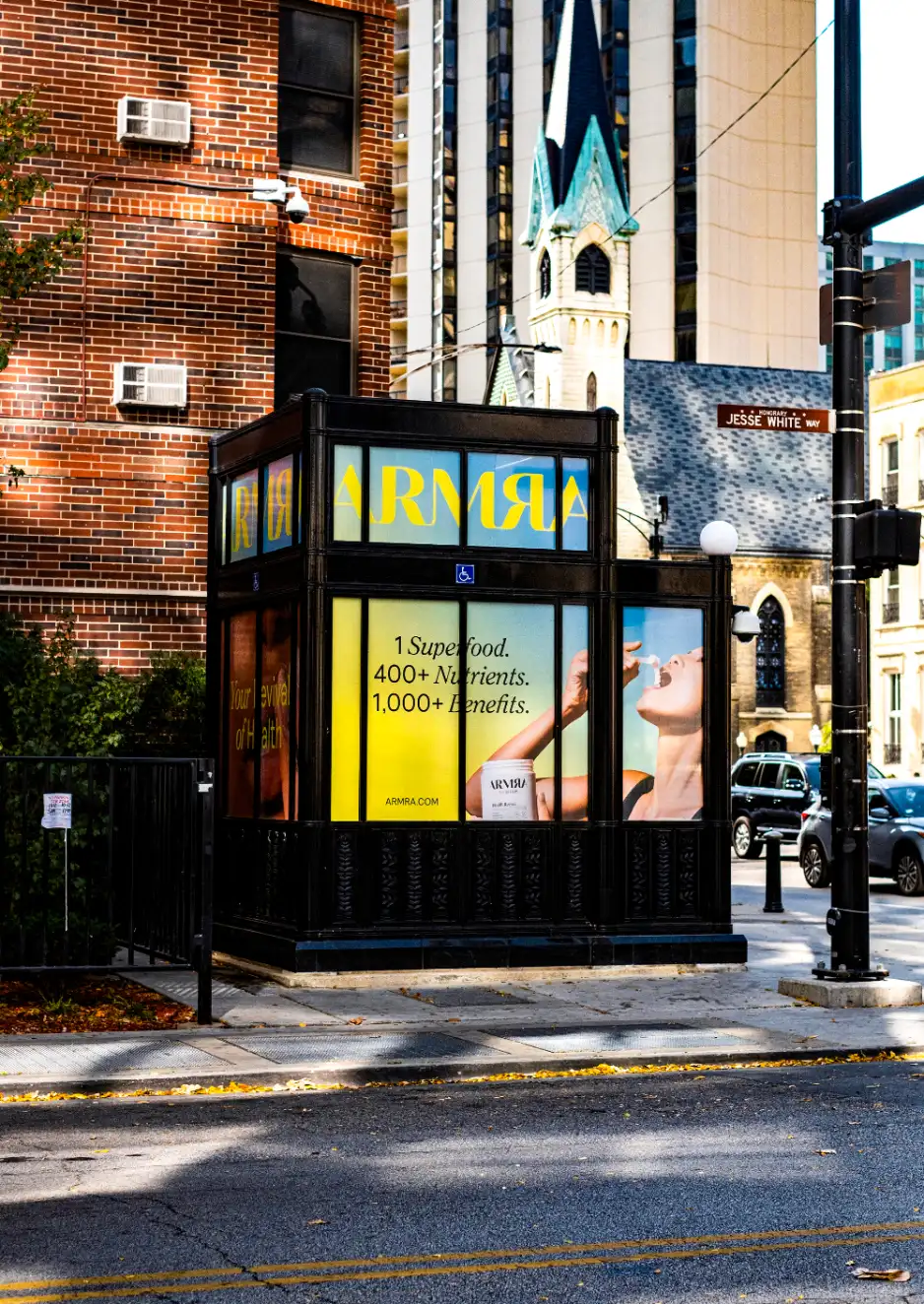 ARMRA-wrapped newsstand kiosk on a city corner